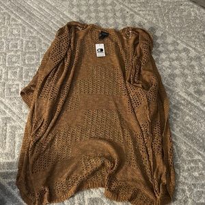 Size small buckle cover up. Brown. Super good material. new with tags
